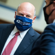 Postmaster General Louis DeJoy (left) talks with Representative Mark Walker before a hearing before the House Oversight and Reform Committee on August 24, 2020 in Washington, DC.